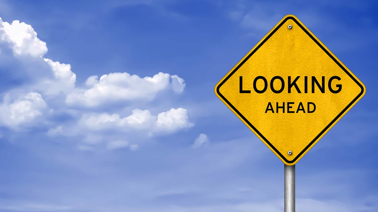 Image of a road sign message - Looking Ahead