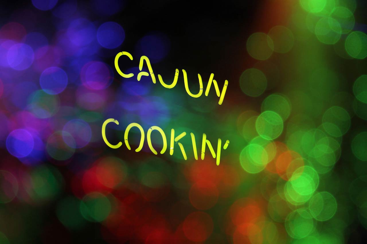 The neon sign cajun food with festive bokeh