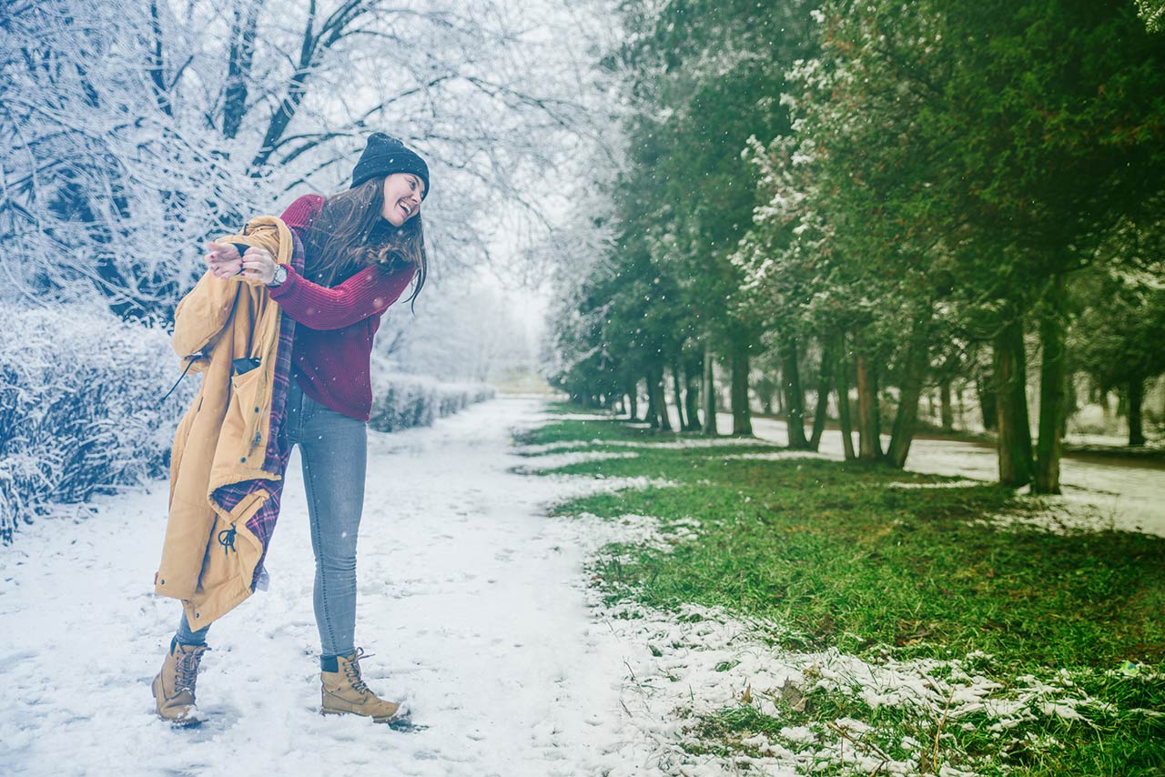 Photo of a young woman happy spring is came undressing