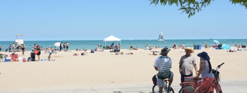 Beach goers at North Avenue Beach in Chicago, Illinois
