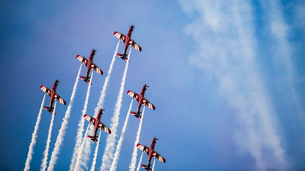 6 planes flying in a v shaped formation