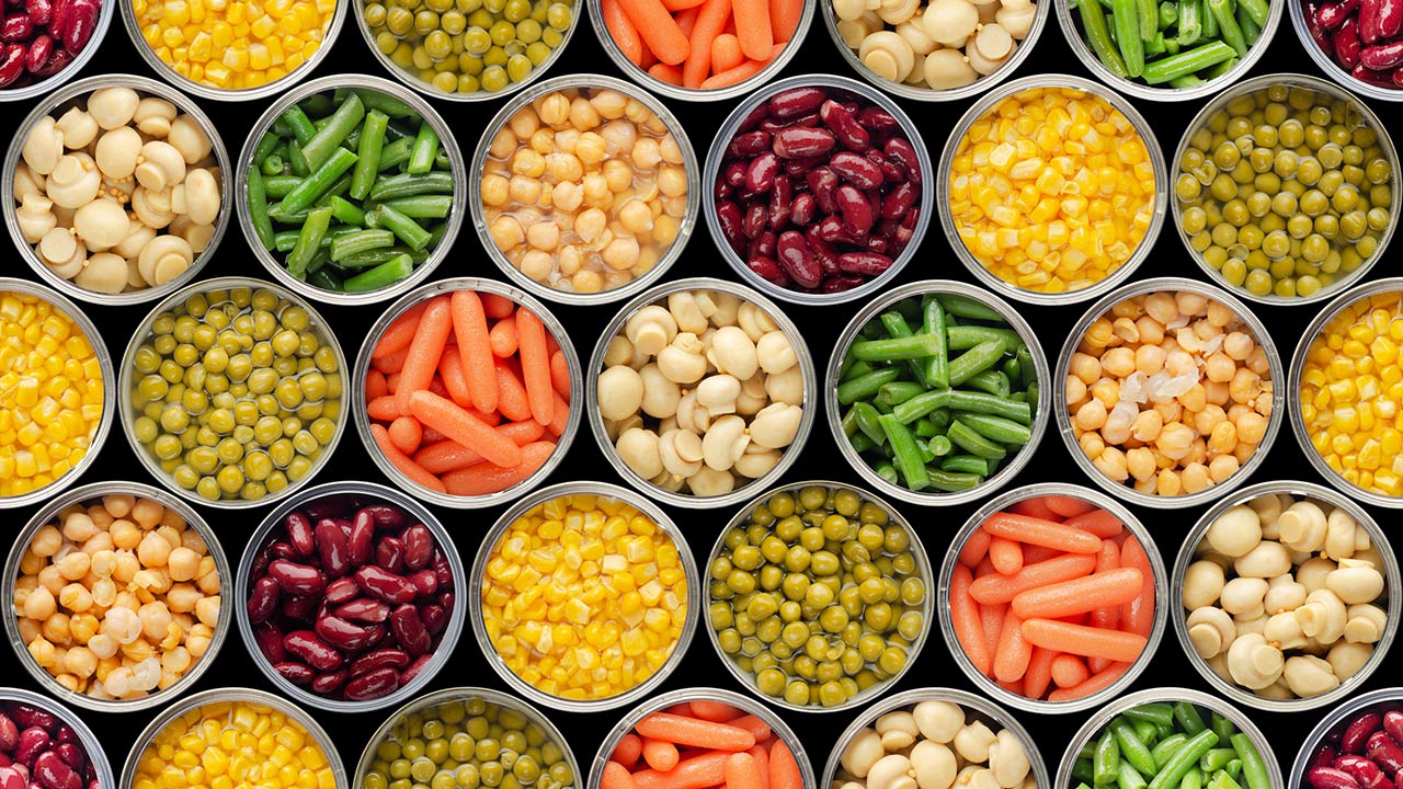 Seamless food background made of opened cans of food