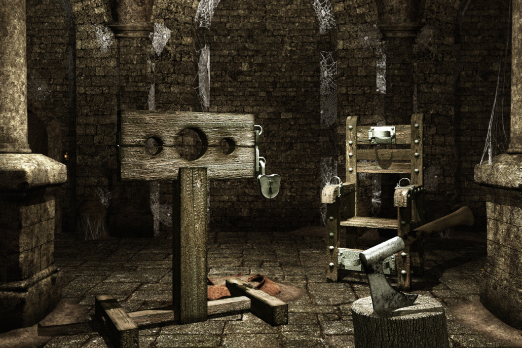 Medieval torture chamber with stocks and trunk of the executioner