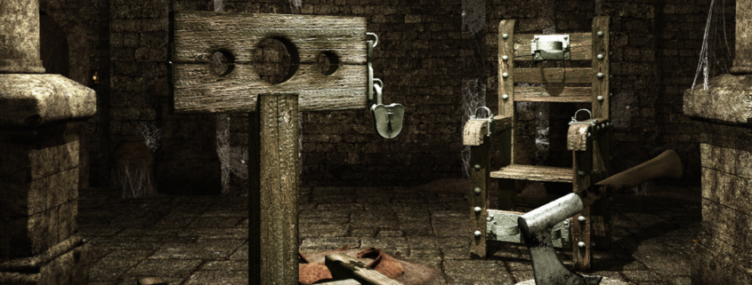 Medieval torture chamber with stocks and trunk of the executioner