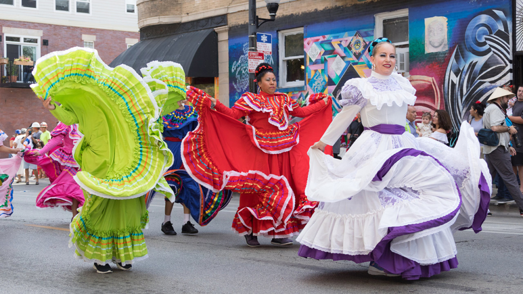 Pilsen Mexican Independence Day Parade with Aztec women dancing