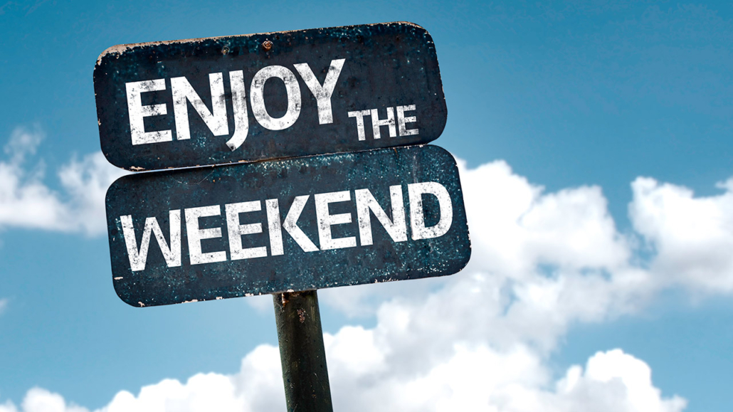 Enjoy the Weekend sign with clouds and sky background