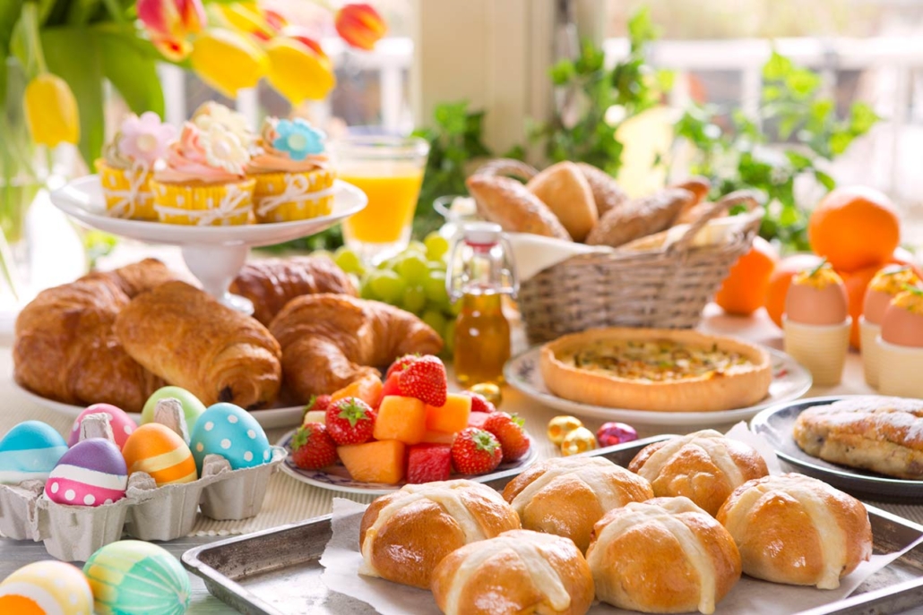 brunch table filled with all sorts of delicious delicatessen for easter