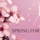spring blossoms on mauve background with a daylight saving time begins concept
