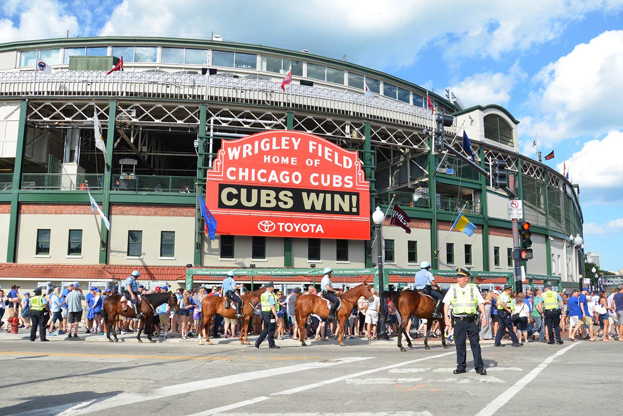wrigley field, home of the chicago cubs with fans are celebrating their 7-2 win against the philadelphia phillies
