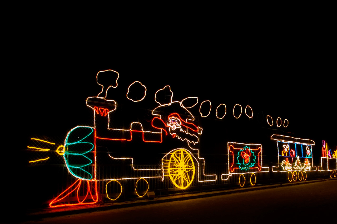 Santa train light display light up at night