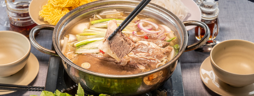 Delicious traditional dishes of food, meat, salads and vegetable for Asian family stock photo