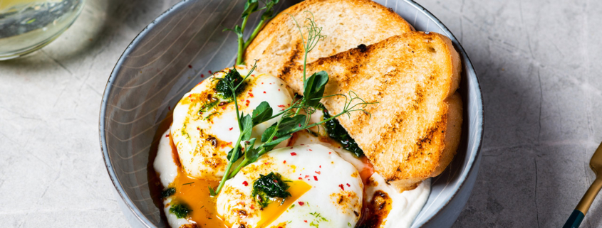 Turkish breakfast in a grey bowl on marble background stock photo