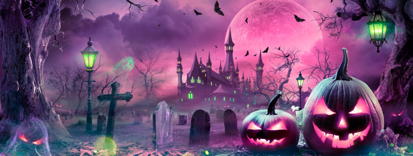Halloween Pumpkins In Spooky Night With Purple Moon And Cemetery stock photo